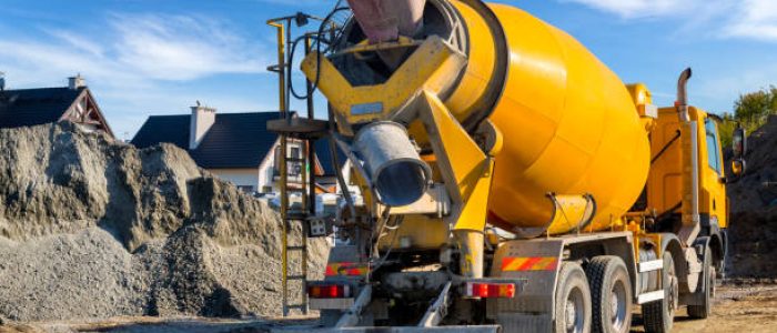 Concrete mixer truck on the construction of a local road in the suburbs, Szczecin, Poland