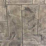 Carreau en béton décoratif – Motif pierres rectangulaires grises