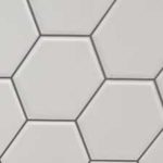 Carreau décoratif blanc à motifs hexagonaux