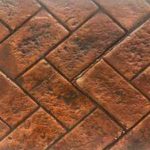 Carreau en béton décoratif – Rouge métallisé effet pierres empilées